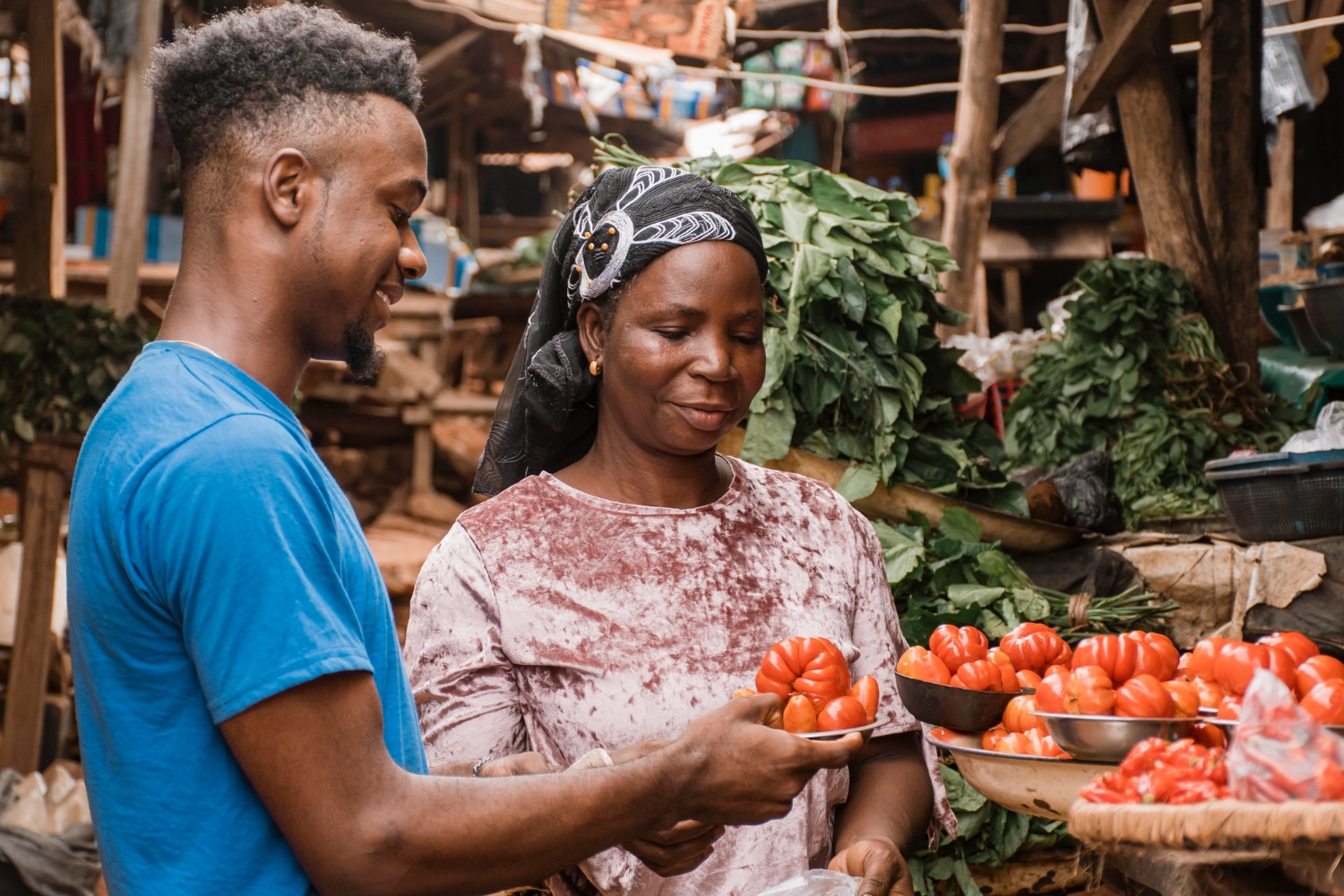 man holding vegetables